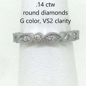 .14 ctw diamonds G color, VS1 clarity band 14kt WG